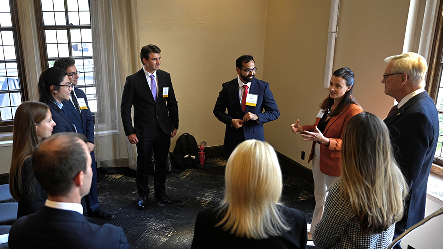 Meera Doran, Maxwell Kawada, Christopher Peter, Peter Meshkov and Shaiv Mehra and John Anderson listen to Haley Oliver-Jischke speak.