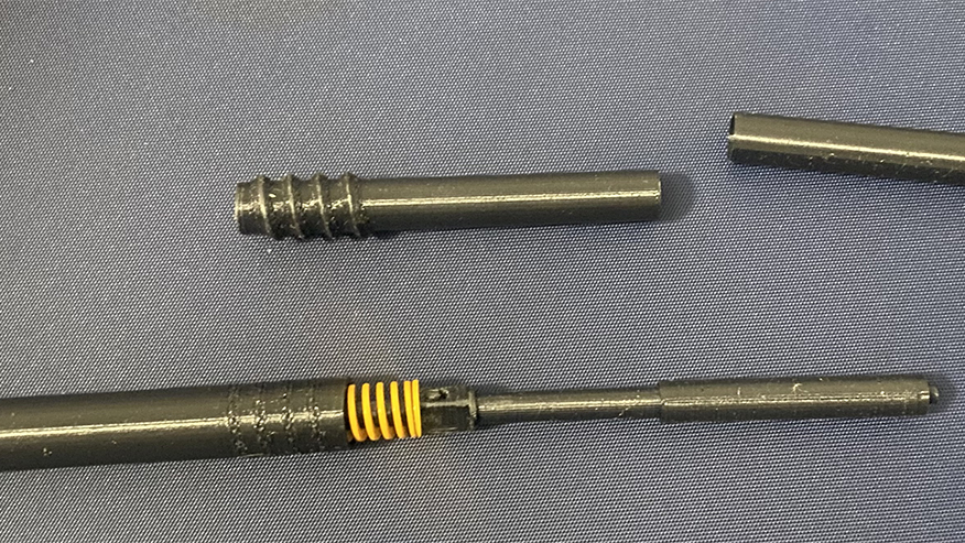 Three metallic tubes