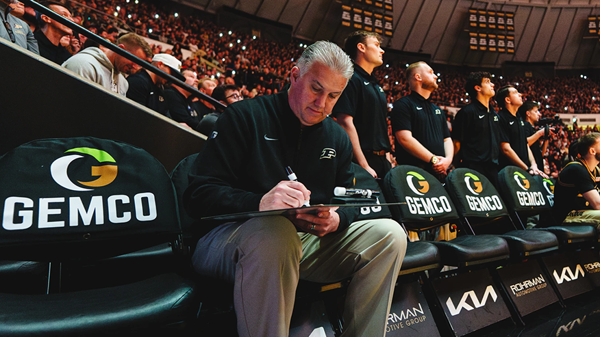Head coach Matt Painter writing on whiteboard