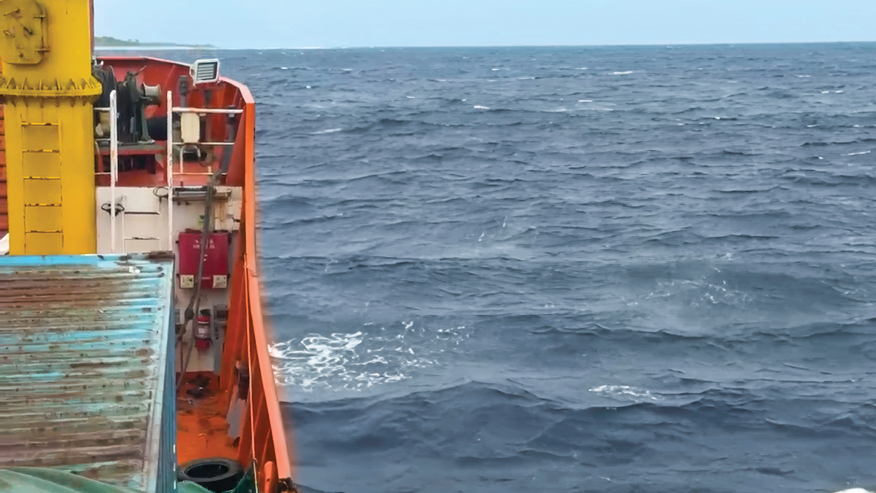 Rough seas near South Pacific island Nikumaroro viewed from aboard a vessel supporting the expedition.