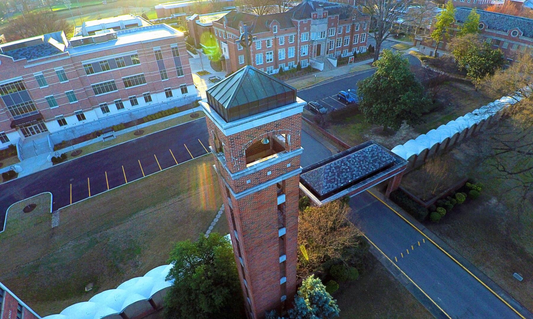 An aerial photo of Cristian Brother's University campus, showing brick building and a brick spire.