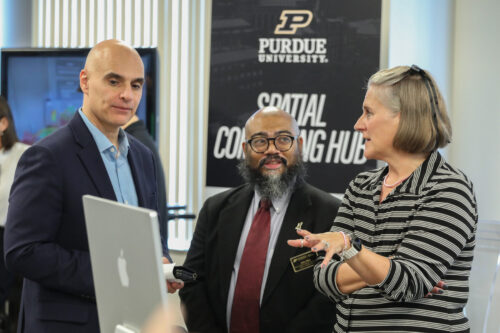 Purdue Senior Vice President for Partnerships and Online Dimitrios Peroulis looks at a demonstration with Purdue Professor and Marvin and Melanie Richardson Department Head of Pharmacy Practice at Purdue University College of Pharmacy John Allen, and Clinical Professor of Pharmacy Practice and Director of Radiopharmaceutical Programs at Purdue University Kara Weatherman. Purdue Senior Vice President for Partnerships and Online Dimitrios Peroulis looks at a demonstration with Purdue Professor and Marvin and Melanie Richardson Department Head of Pharmacy Practice at Purdue University College of Pharmacy John Allen, and Clinical Professor of Pharmacy Practice and Director of Radiopharmaceutical Programs at Purdue University Kara Weatherman.
