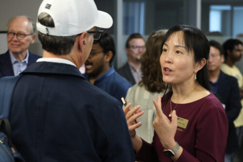 Reilly Professor of Electrical and Computer Engineering at Purdue University Zhihong Chen discusses the new spatial computing technology with colleagues. Reilly Professor of Electrical and Computer Engineering at Purdue University Zhihong Chen discusses the new spatial computing technology with colleagues.