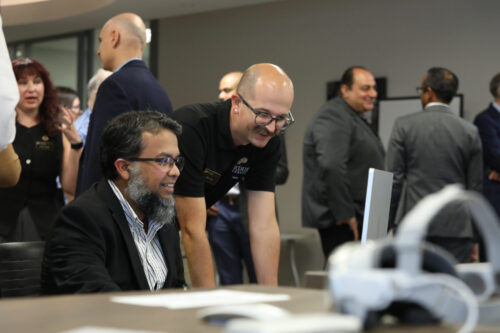 Purdue Professor of Electrical and Computer Engineering Muhammad Hussain discusses his project with Purdue Full Stack Developer Lakin Lane, explaining how the new spatial technology can help train others on Chemical Mechanical Polishing (CMP). Purdue Professor of Electrical and Computer Engineering Muhammad Hussain discusses his project with Purdue Full Stack Developer Lakin Lane, explaining how the new spatial technology can help train others on Chemical Mechanical Polishing (CMP).