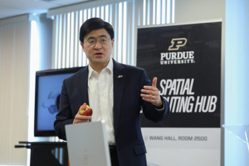 Purdue University President Mung Chiang welcomes the campus community to the grand opening of Purdue’s new Spatial Computing Hub. Purdue University President Mung Chiang welcomes the campus community to the grand opening of Purdue’s new Spatial Computing Hub.
