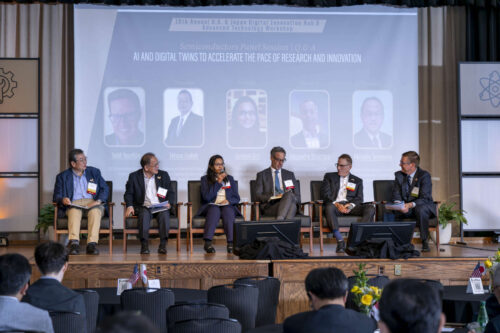 (From left to right) Panelists Tetsuo Endoh, Akinobu Teramoto (director of the Research Institute for Semiconductor Engineering at Hiroshima University), Janhavi Giri (principal architect, Semiconductors, EDA & AI, NetApp), Alejandro Strachan (Reilly Professor of materials engineering at Purdue University), Rick Gottscho, and moderator Todd Younkin, CEO of the Semiconductor Research Corporation. A group of technology, AI and engineering leaders speak at Purdue University, led by moderator Todd Younkin.