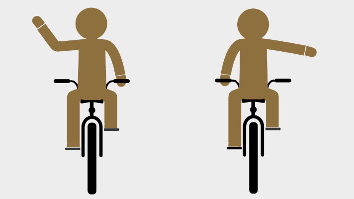 Person riding a bike holding out their left arm up in a 90 degree angle and another person on a bike holding their right arm out straight