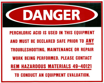 Danger sign warning that perchloric acid is used and equipment must be declared safe before service.