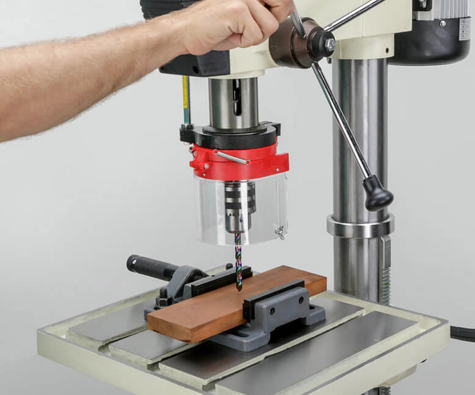 Drill press with proper guarding