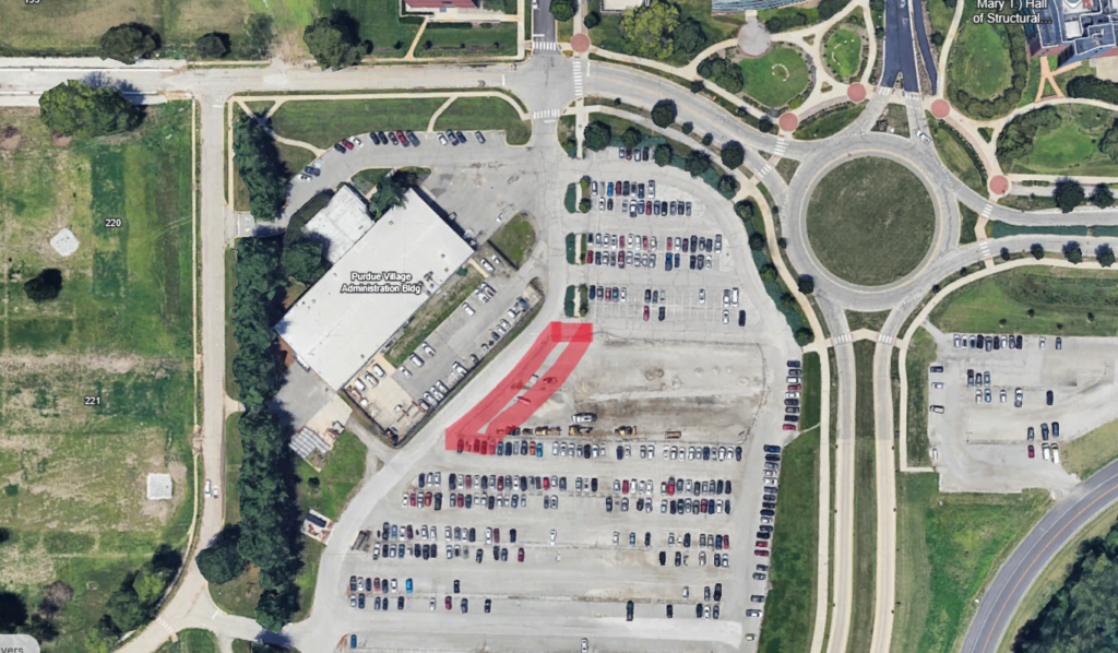 Primary staff meeting location ,south side of building in parking lot