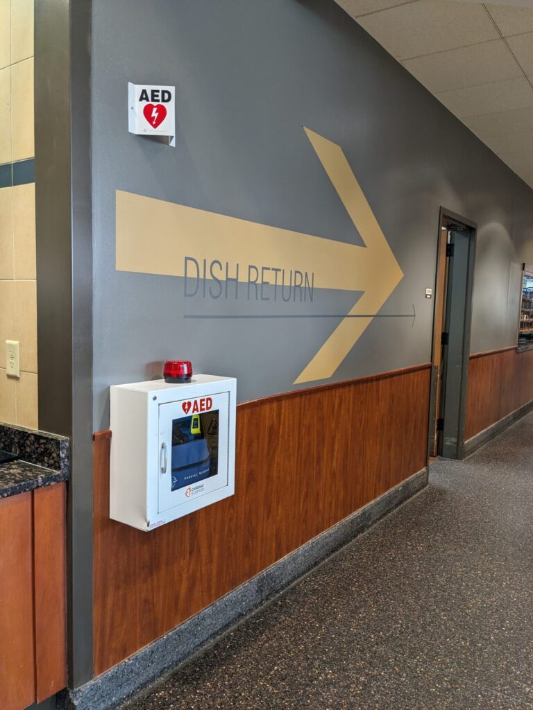 AED located near dish return area