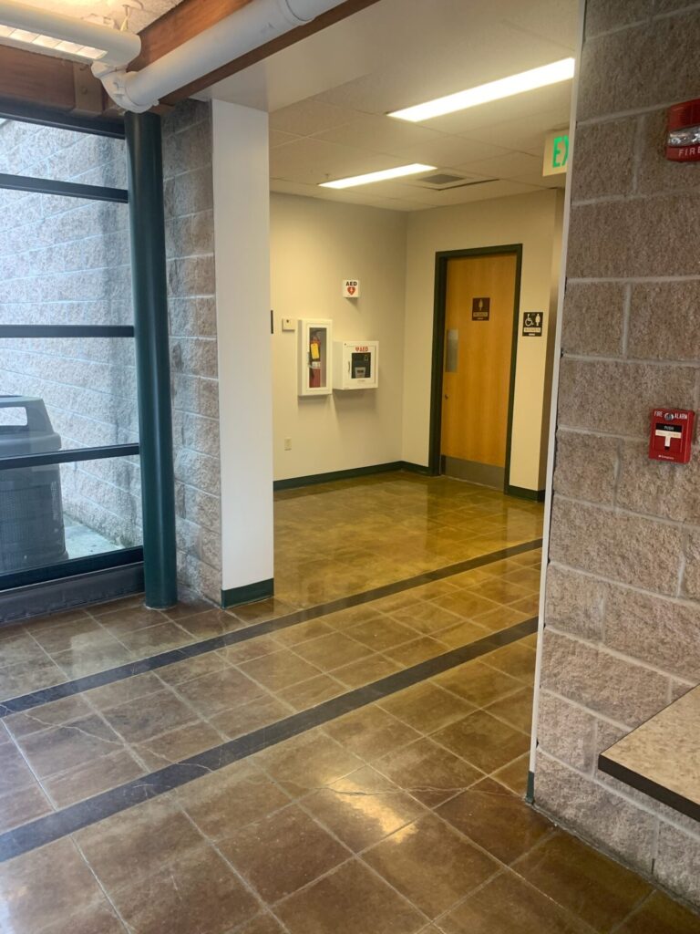 Photo of AED location while standing in entrance foyer