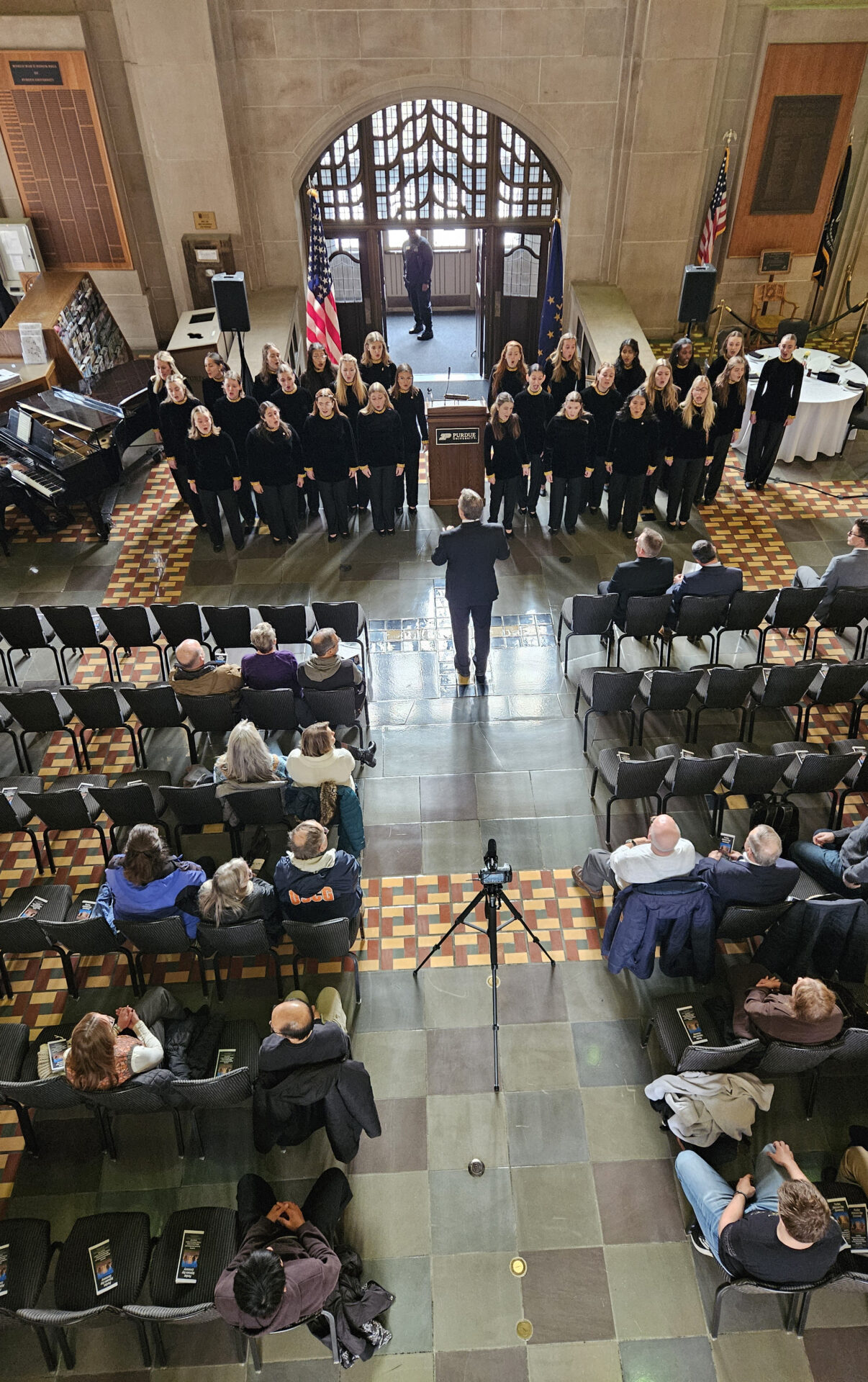 Looking down on crowd and Purduettes performing at Veterans Day Ceremony.