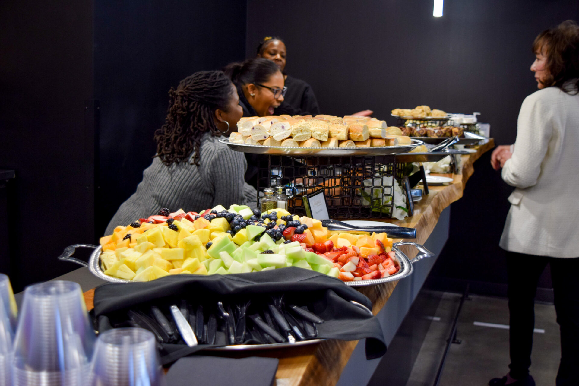 A buffet of fruit and sandwiches at the R2P event.