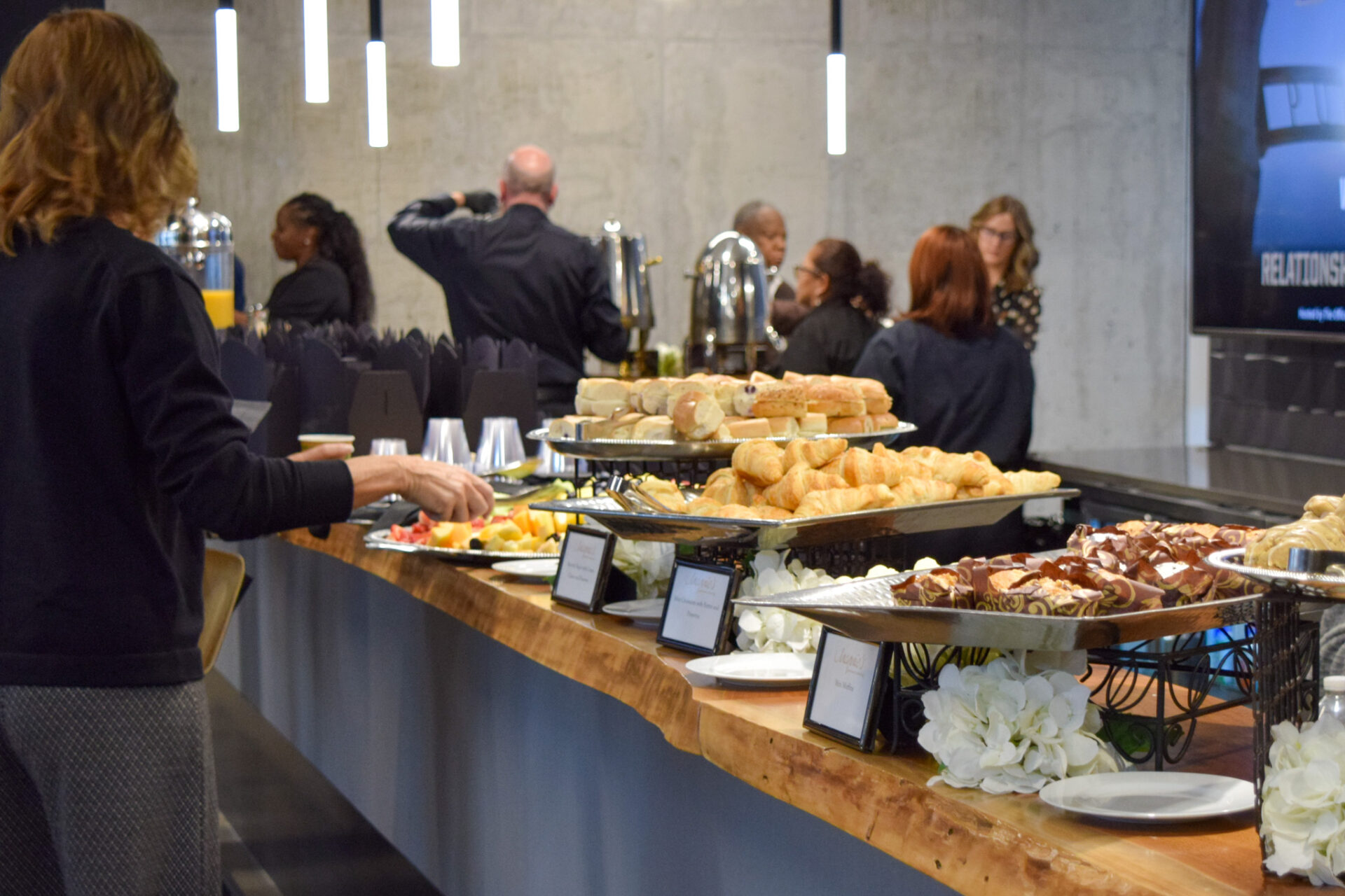 The buffet at the R2P event with various sandwiches and desserts.