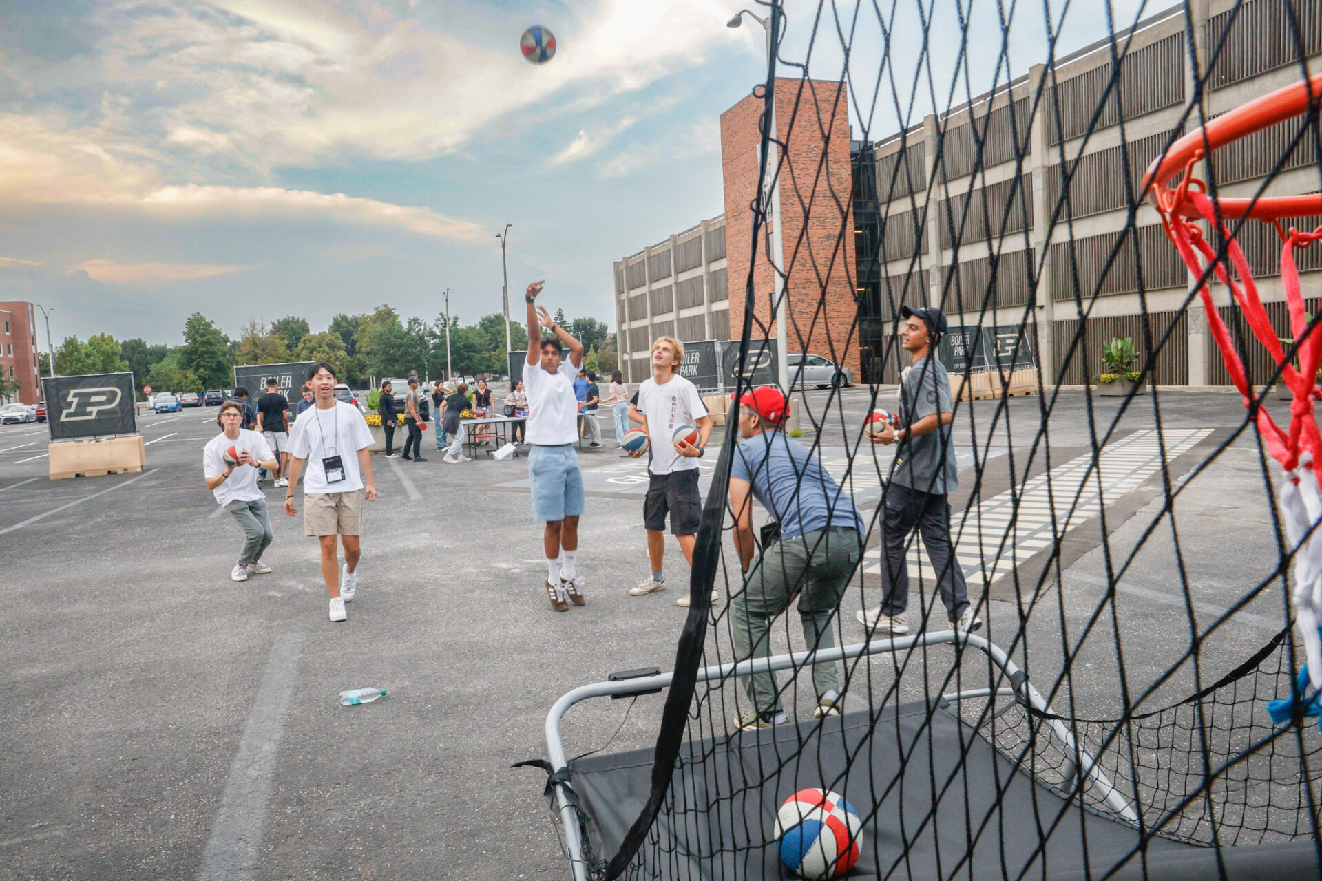 Students playing basketball at Boiler Park