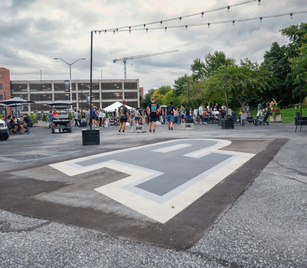 Students in Boiler Park with Purdue graphics and lighting