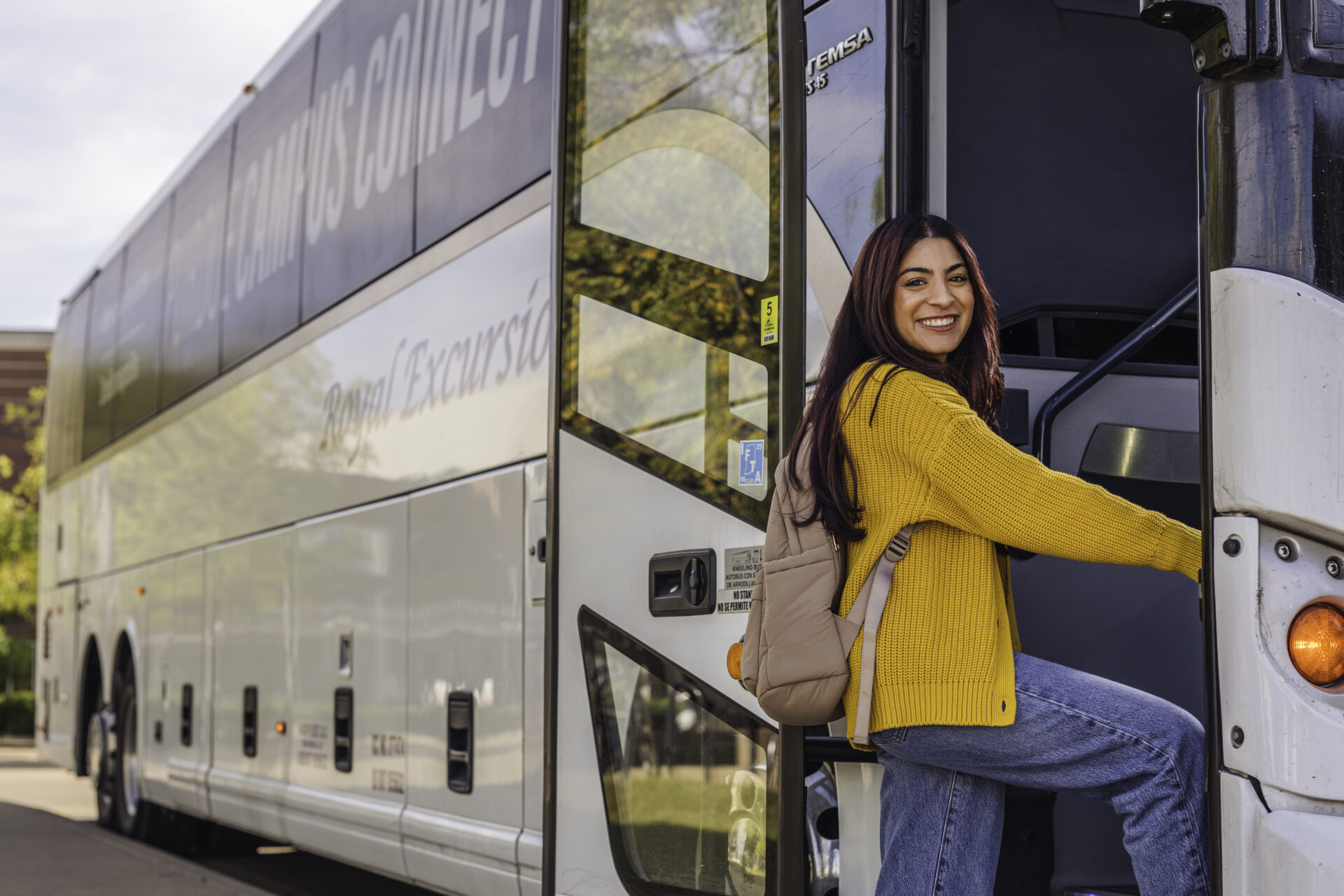 Person preparing to board a Campus Connect shuttle