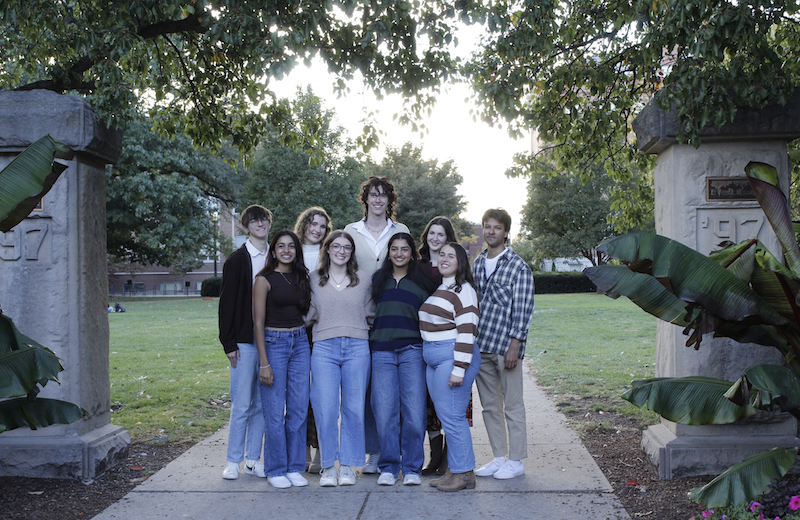 Group of students standing in front of the Welcome Path.