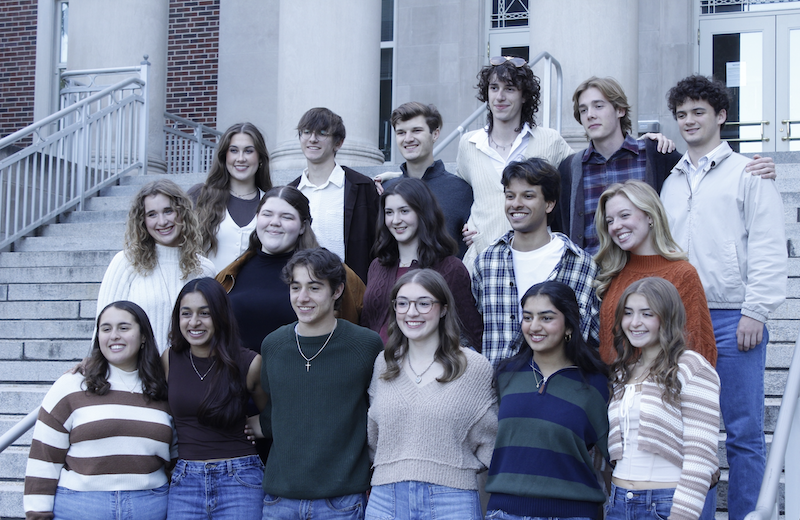 A group of PMO students standing together and smiling