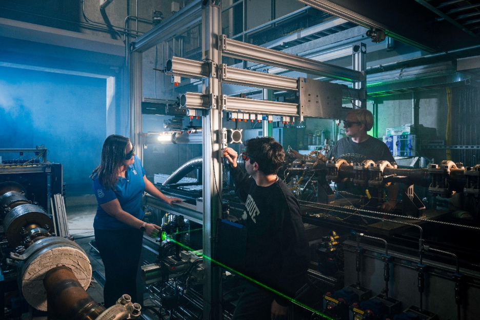 Students working with lasers