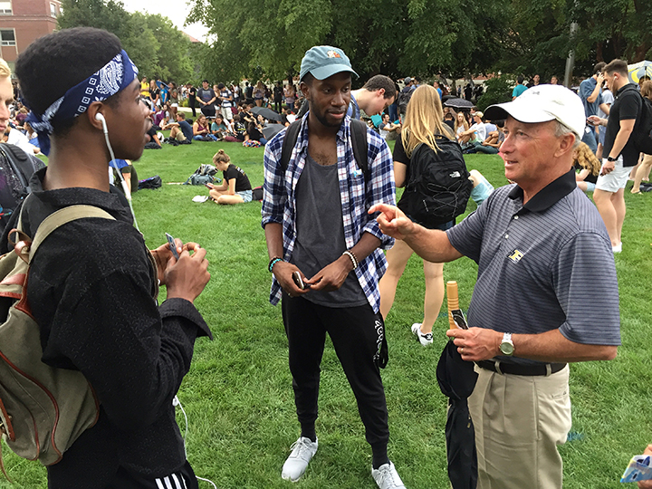 President Daniels talks with students on Memorial Mall