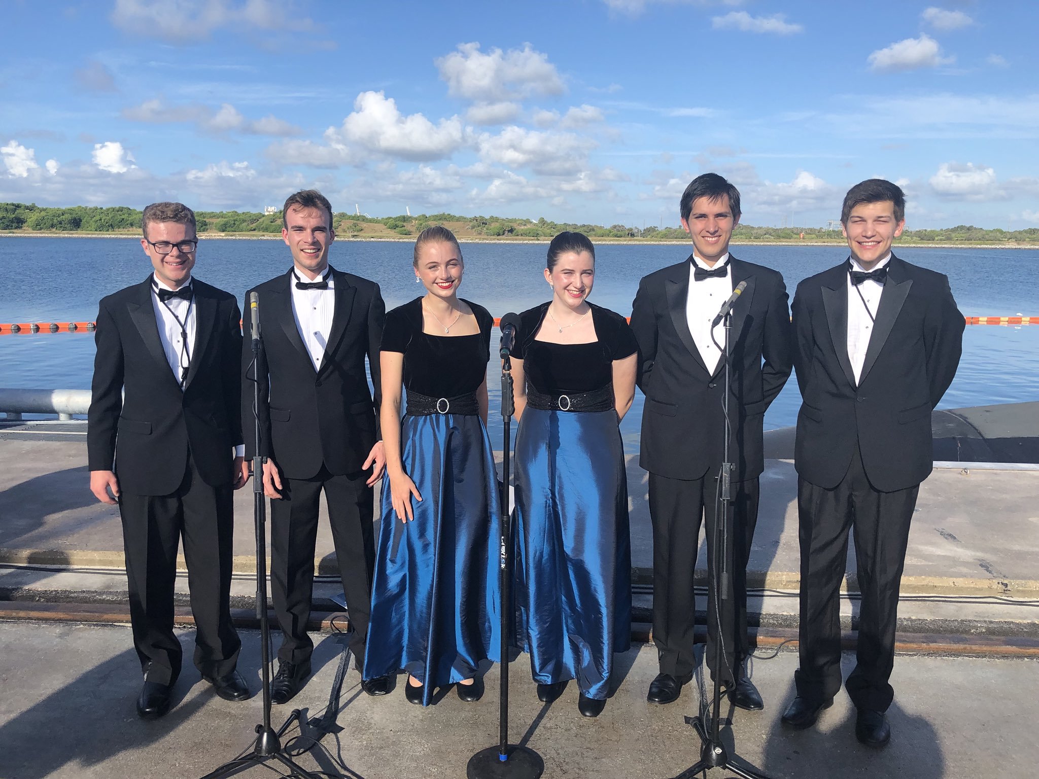 Six PMO members pose near the USS Indiana submarine