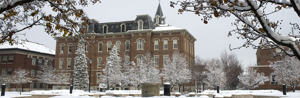 Pictured: banner image of a purdue building in the winter, covered in a light snow