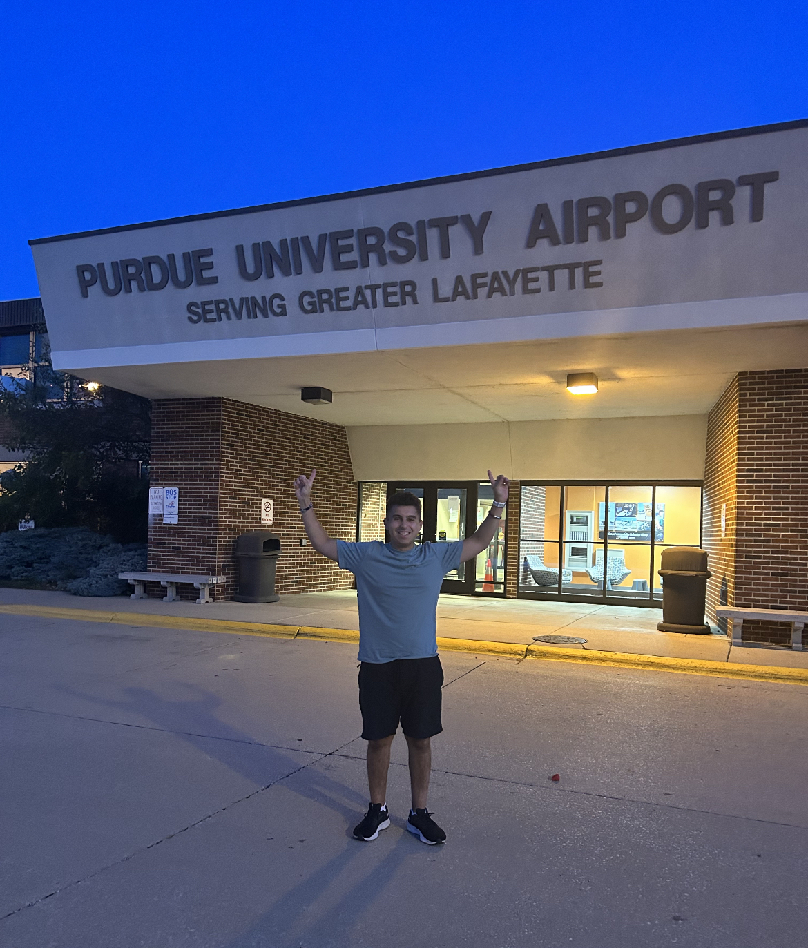 pictured: matthew calvo stands outside the purdue airport