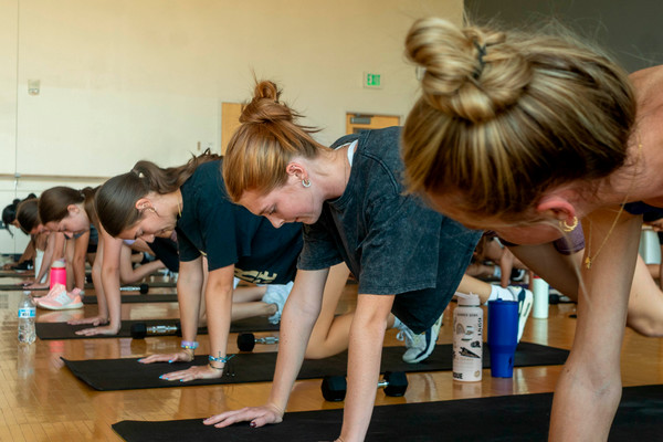 Members holding planks in GX Core Class