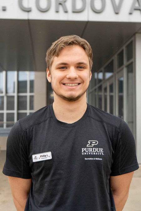 Outdoor headshot of personal trainer