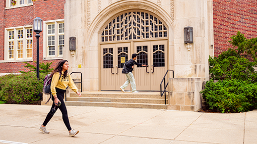 Student walking in front of Purdue Memorial Union