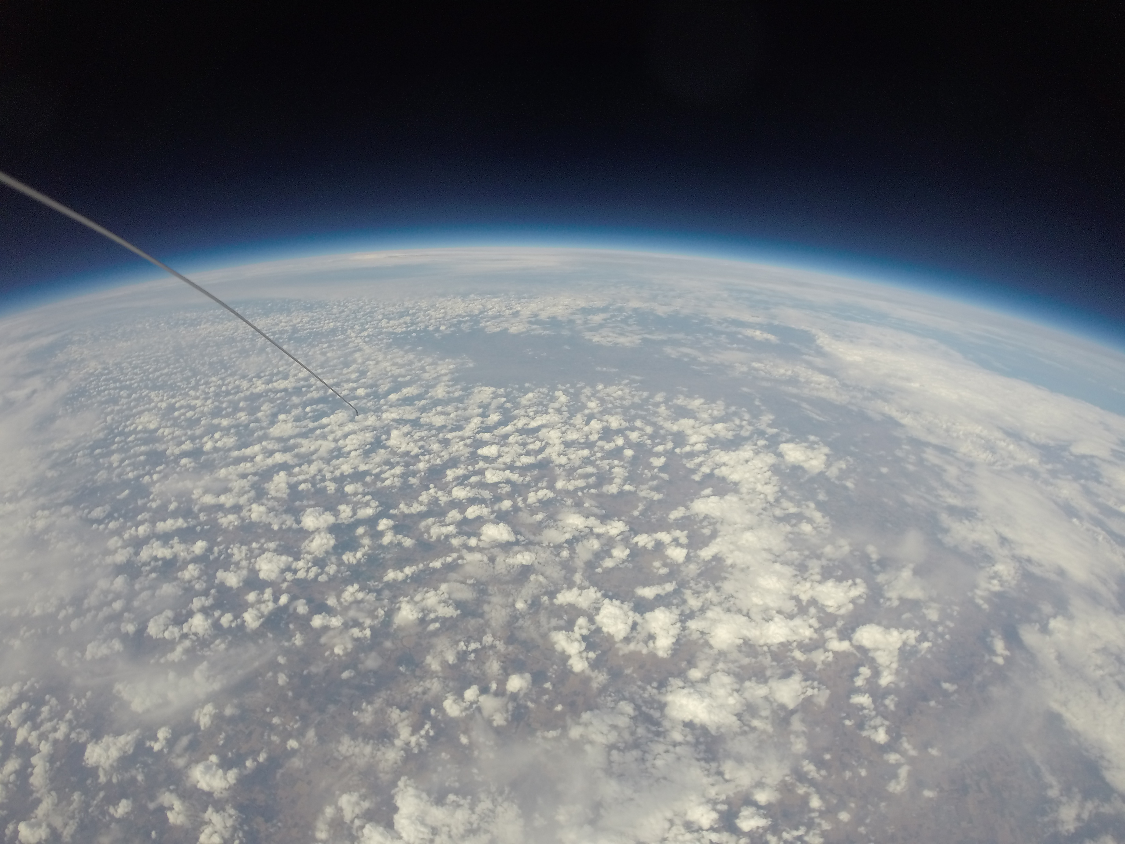Photo from a GoPro on a weather balloon showing the Earth's atmosphere 