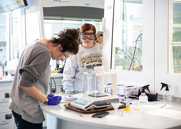 Two undergraduate students engage in hands-on learning in a state-of-the-art lab classroom at Chaney Hale Hall of Science.