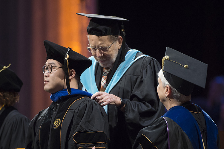 Michael Rossman at commencement in 2018.