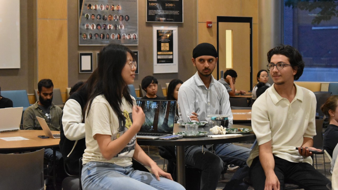 Students speaking at a discussion in Lawson
