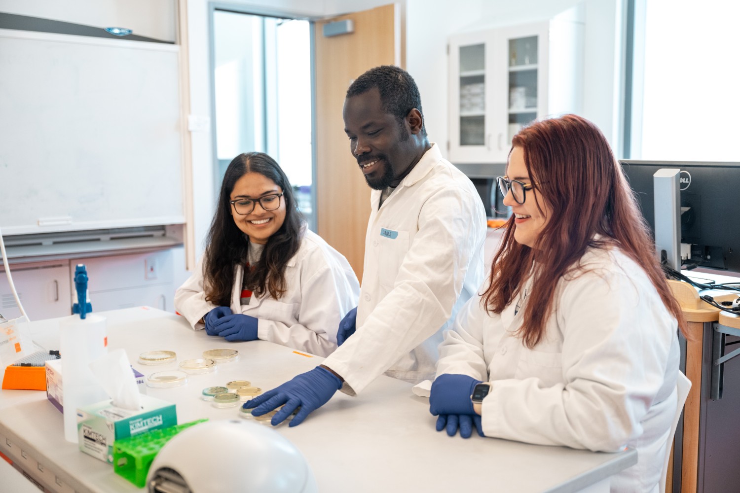 Purdue researcher and students doing a lab demonstration