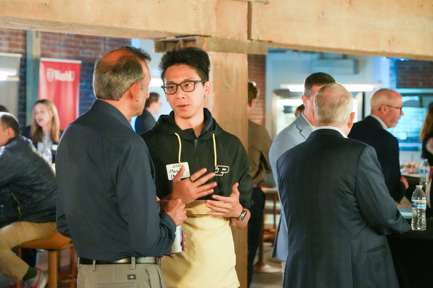 A Purdue student networking at Third Coast Foundry