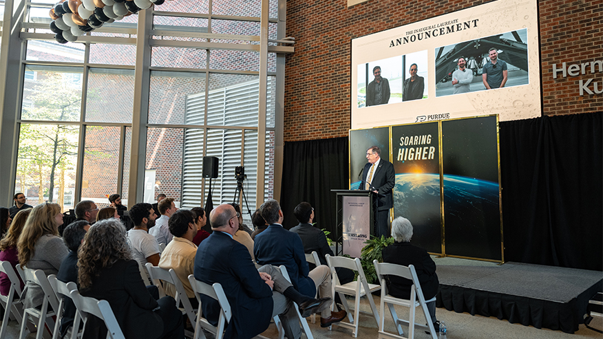 Dan Dumbacher, chairman of the selection committee for Purdue University’s Neil Armstrong Space Prize, introduces the award’s inaugural laureate: five members of the Falcon 9 Booster Landing Team for SpaceX. The recipients will be honored during a September event in Washington, D.C. (Purdue University photo/Kelsey Lefever)