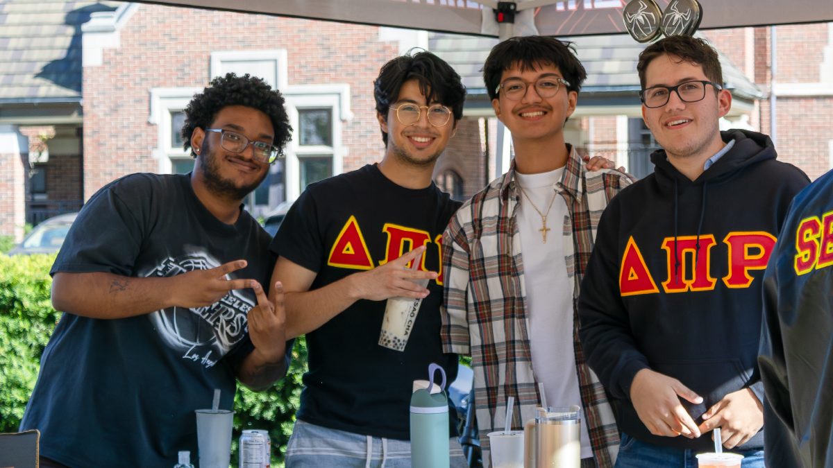A group of young men at an outdoor event