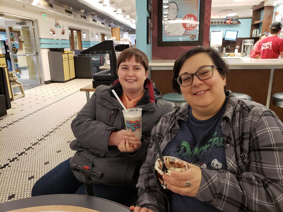 Two Span Plan students enjoy ice cream on campus