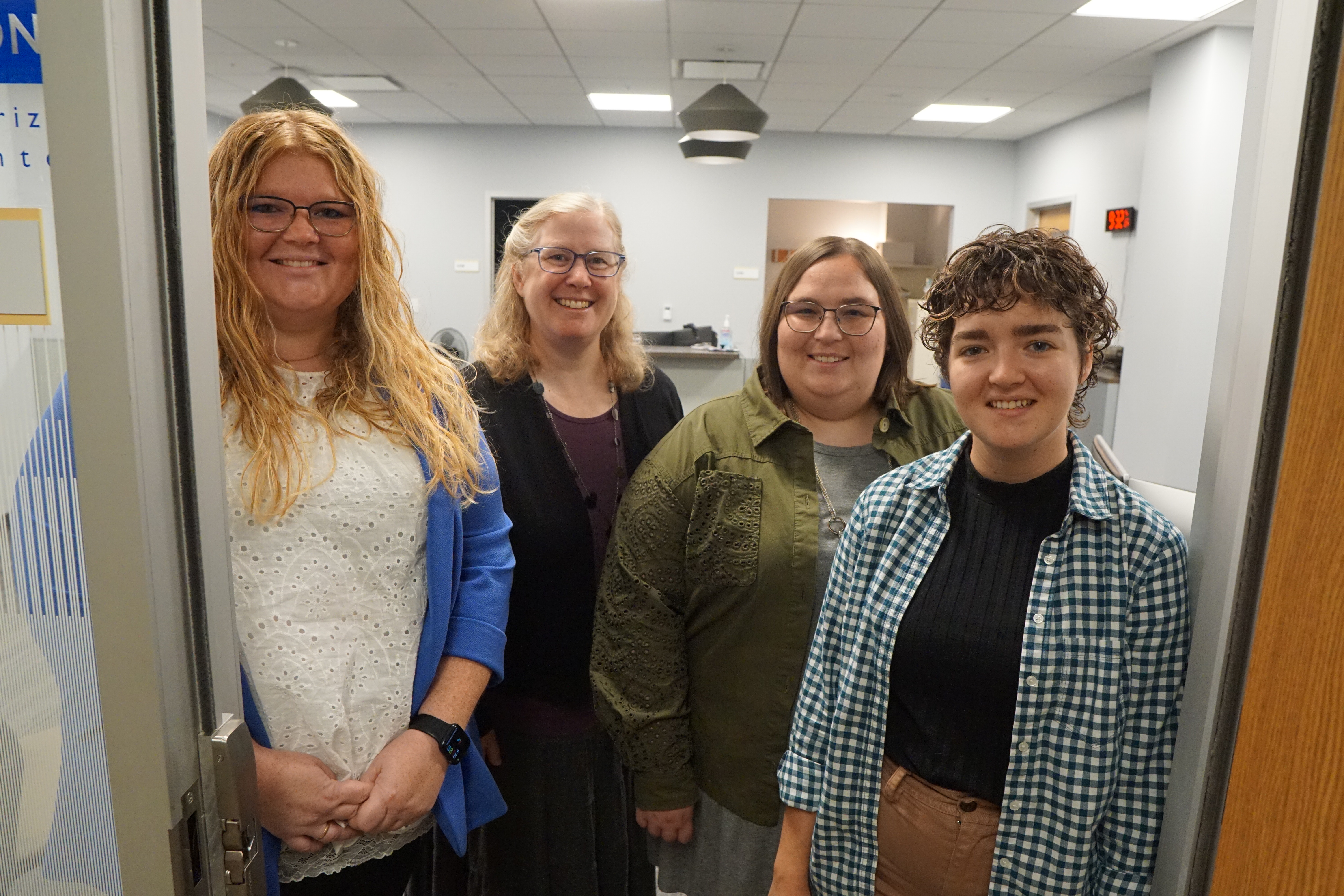 Purdue Testing Services staff stand for a team picture in their new space in Stewart Center. From left to right: Kelsey Jordan, Bahiyyih Baker, Maddie Kintner, and Heather Johnson