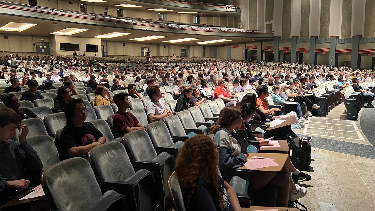 Pictured: Students look up from their seats to listen to instructions before starting their mock exams.