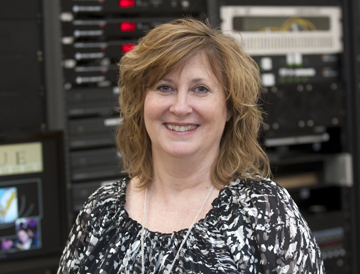 Tina Parker is the manager of Boiler Television, the University's closed-circuit cable system. BTV provides more than 50 cable channels and other television services to more than 7,500 outlets on campus. (Purdue University photo/Mark Simons)