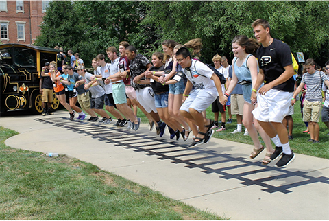 new students crossing tracks