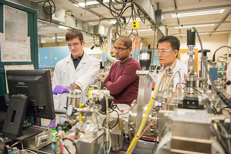 Derek Schwanz, Shriram Ramanathan and Zhen Zhang in lab