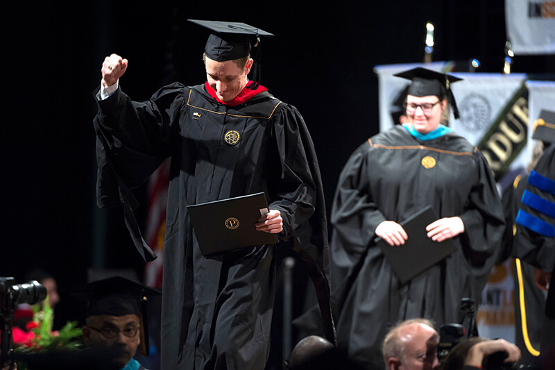 Purdue graduate at commencement ceremony