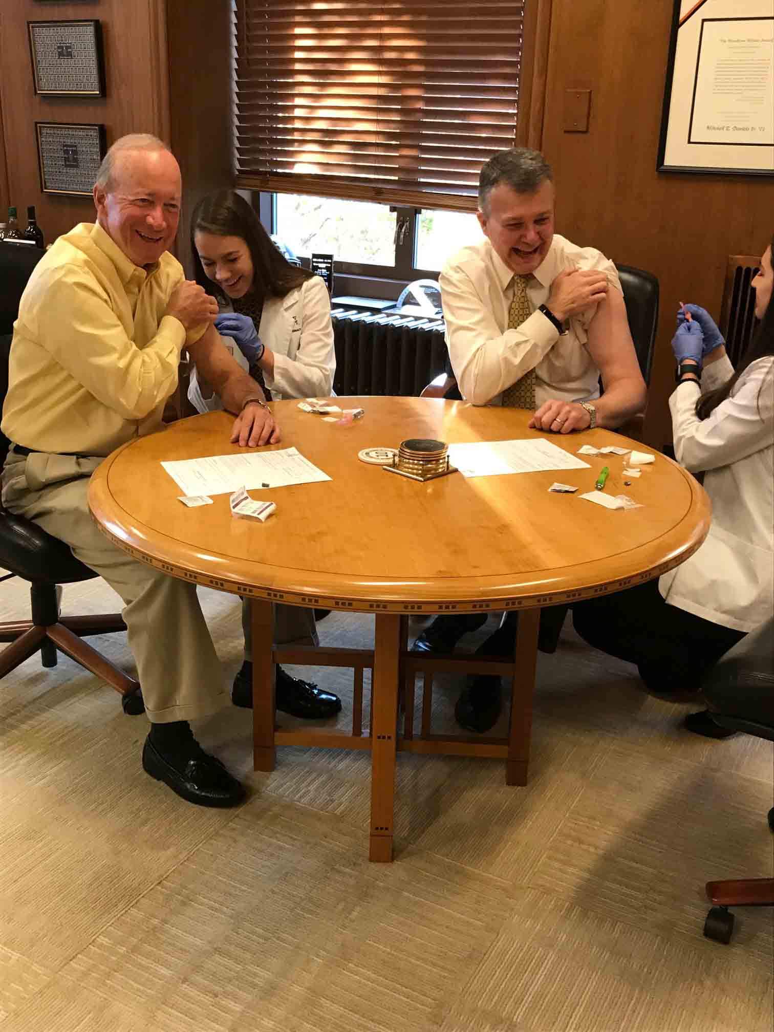 Mitch Daniels and Jay Akridge receive flu shots