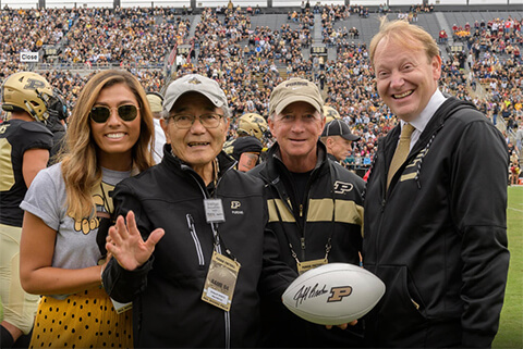 Ashlyn East, Ei-ichi Negishi, Mitch Daniels and Patrick J. Wolfe