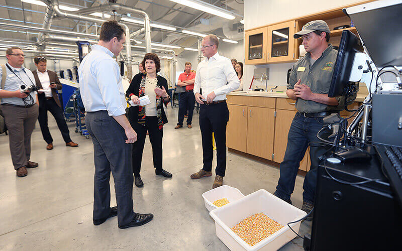 Karen Plaut and Sen. Todd Young in group